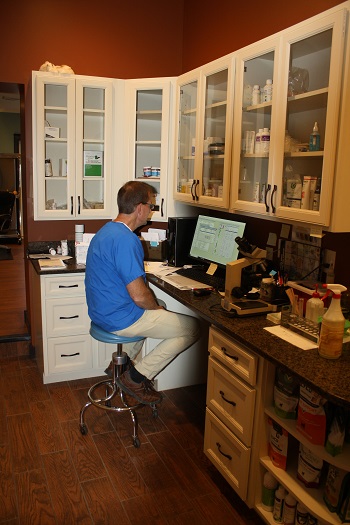 Dr. Davis in the clinic's work area